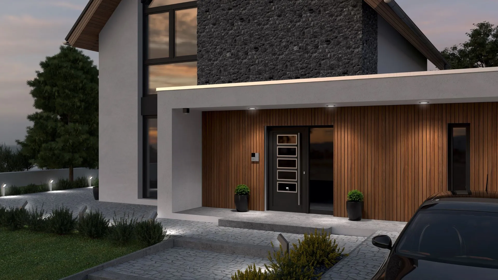 An elegant modern house with a contrasting facade, wood accents, and outdoor lighting.