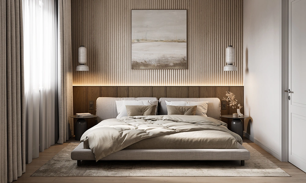 A serene bedroom featuring a large bed with beige bedding, flanked by textured walls and wooden accents, complemented by soft lighting and a neutral color palette.