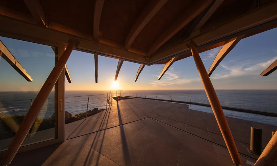 Terrace of Villa “Lion’s Ark” with sea view and modern wood-and-glass architecture in Cape Town.